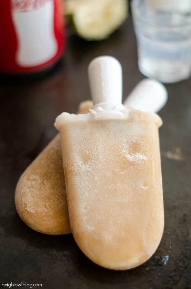 "Dirty" Coca-Cola Popsicles! The perfect summer flavor combo of Coke with a hint of lime, coconut and cream! You've got to try it! recipe at cetcu.com