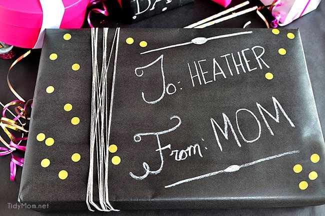 Such a fun inexpensive idea for gifting!! DIY Chalkboard Gift Wrap at cetcu.com