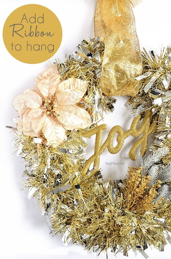 DIY Christmas Decor - Make this easy Tinsel Wreath in under 15 minutes and no glue required! Tutorial at cetcu.com