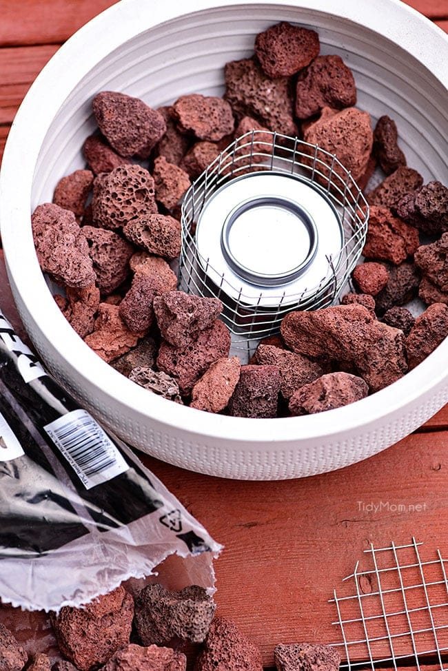 add lava rocks to bowl around sterno can