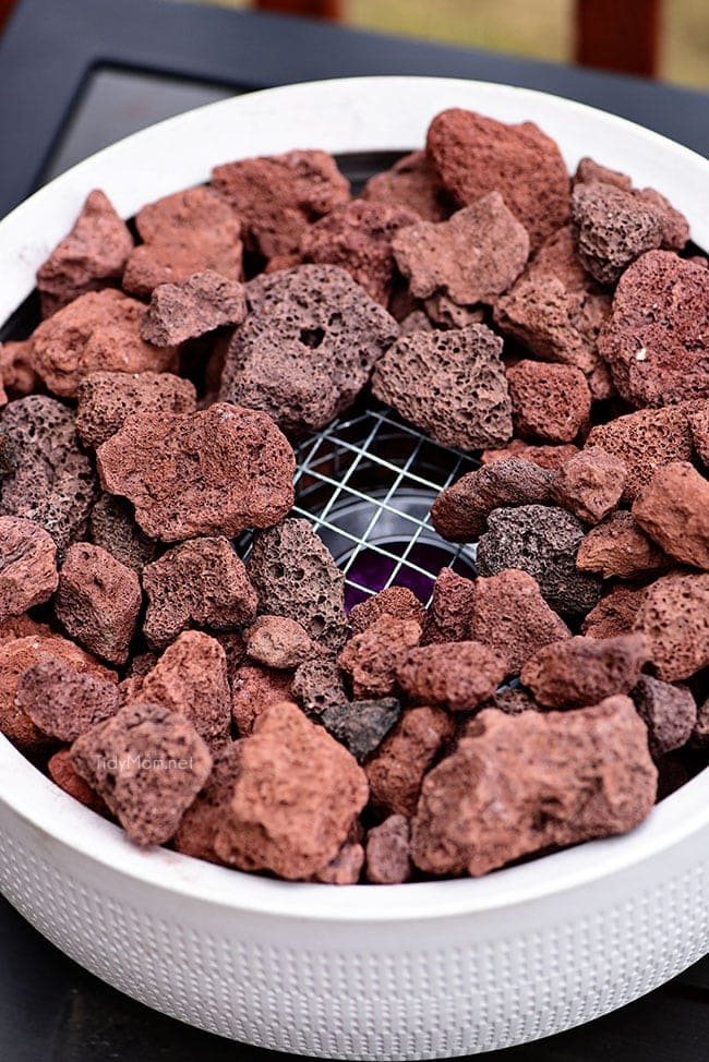 place wire on top to keep rocks away from sterno can