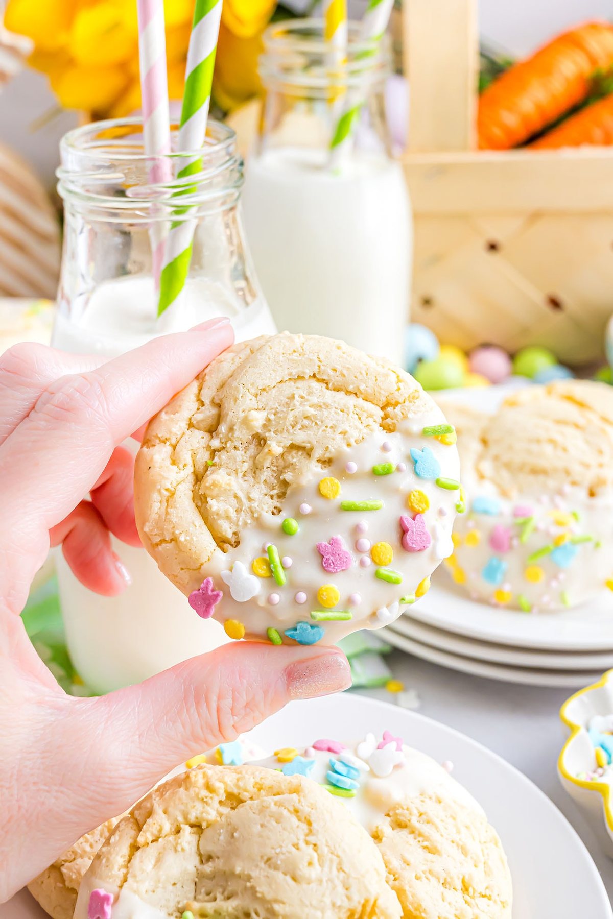 woman's hand holding an Easter cake mix cookie