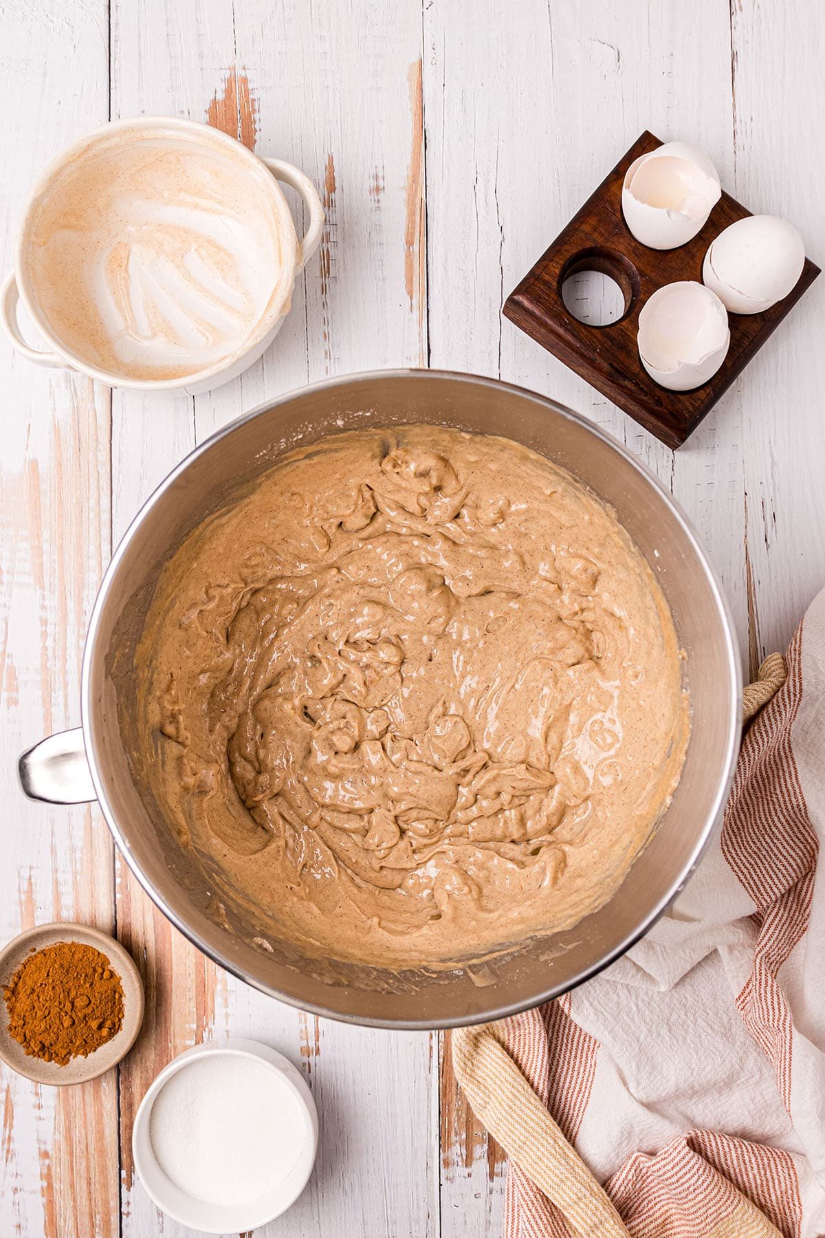 cake batter in electric mixer bowl
