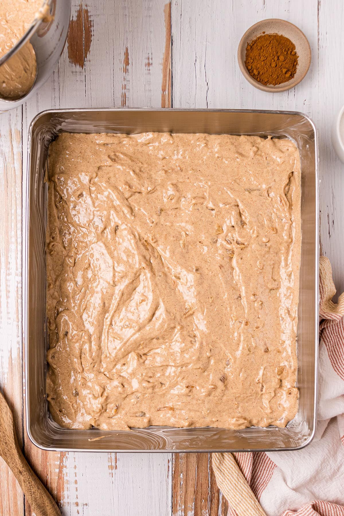 cake filling poured in 9x13 metal cake pan