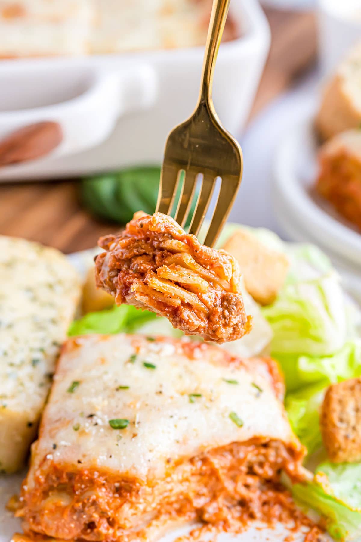fork with a bit of lasagna