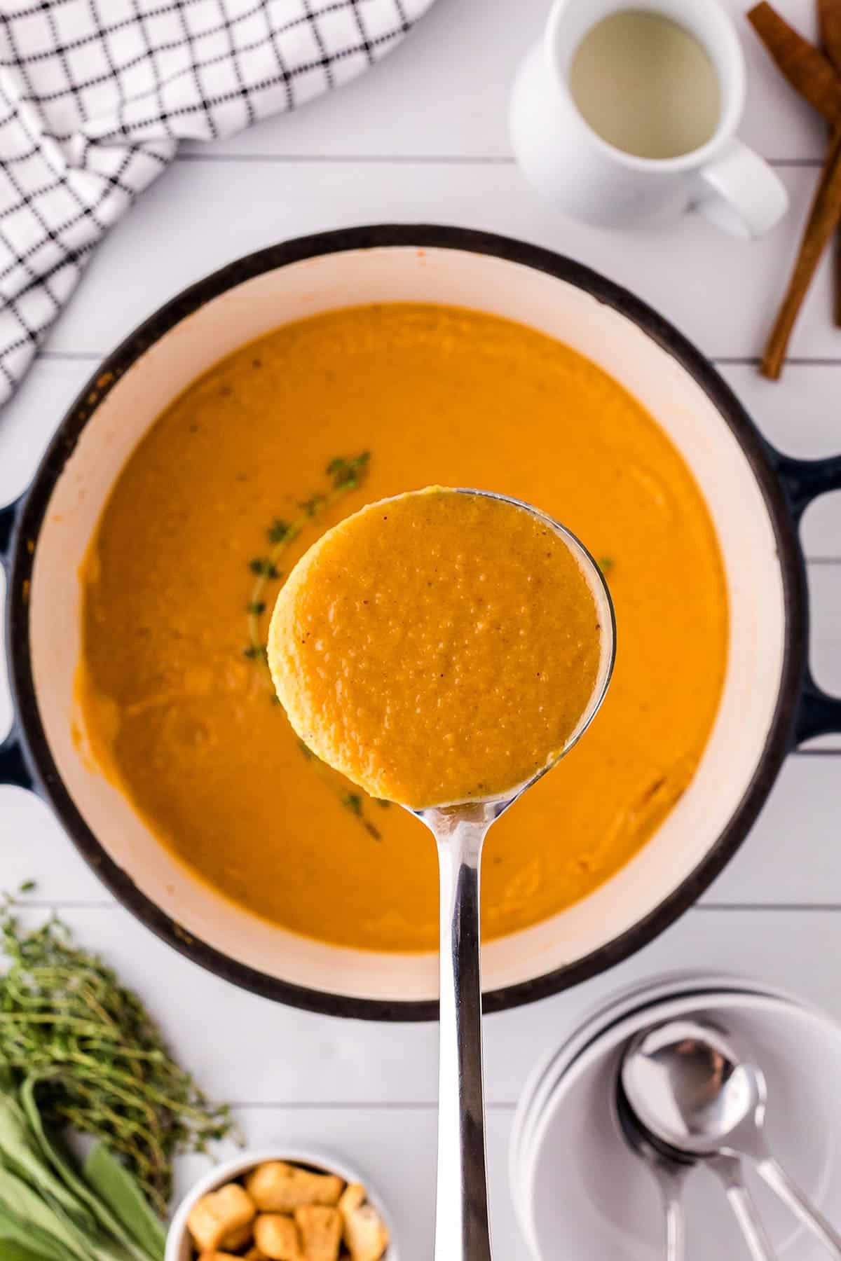 a ladle full of butternut soup