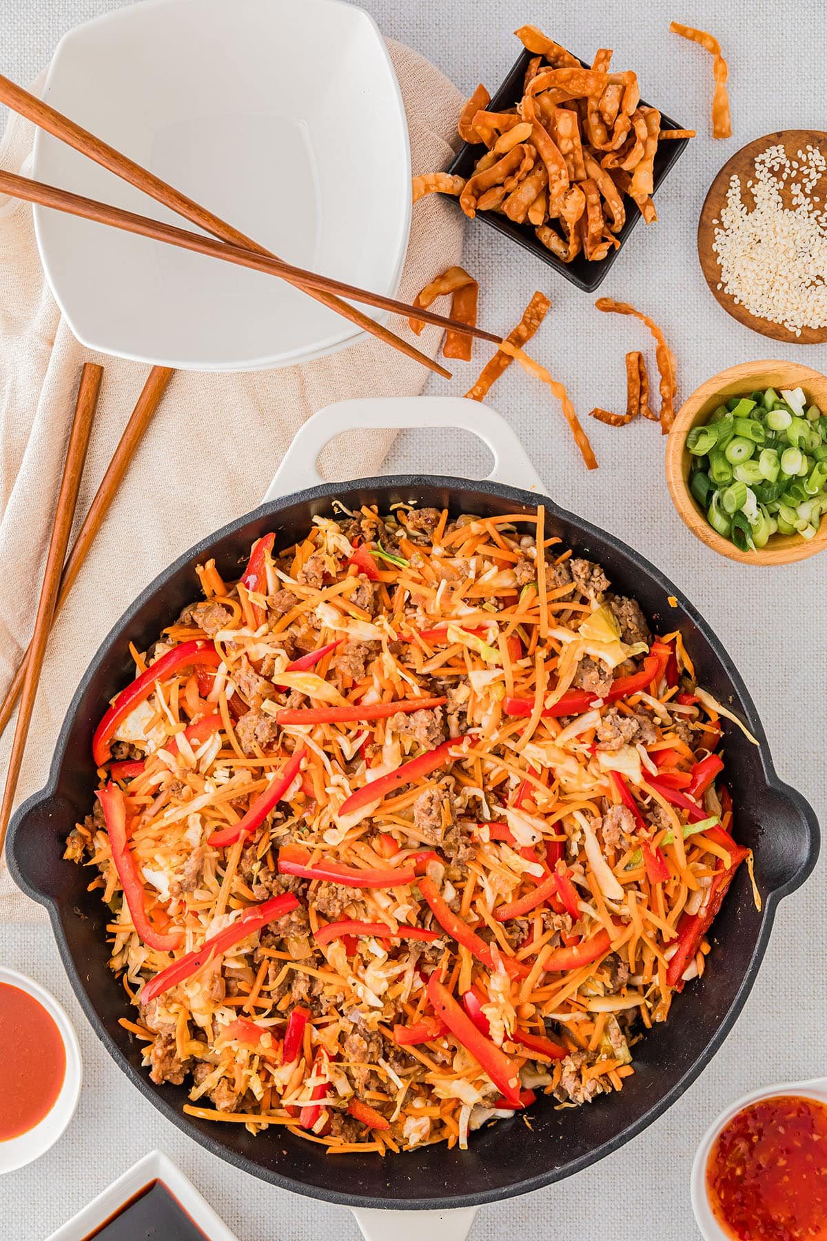 white cast-iron skilled with Egg Roll in a Bowl