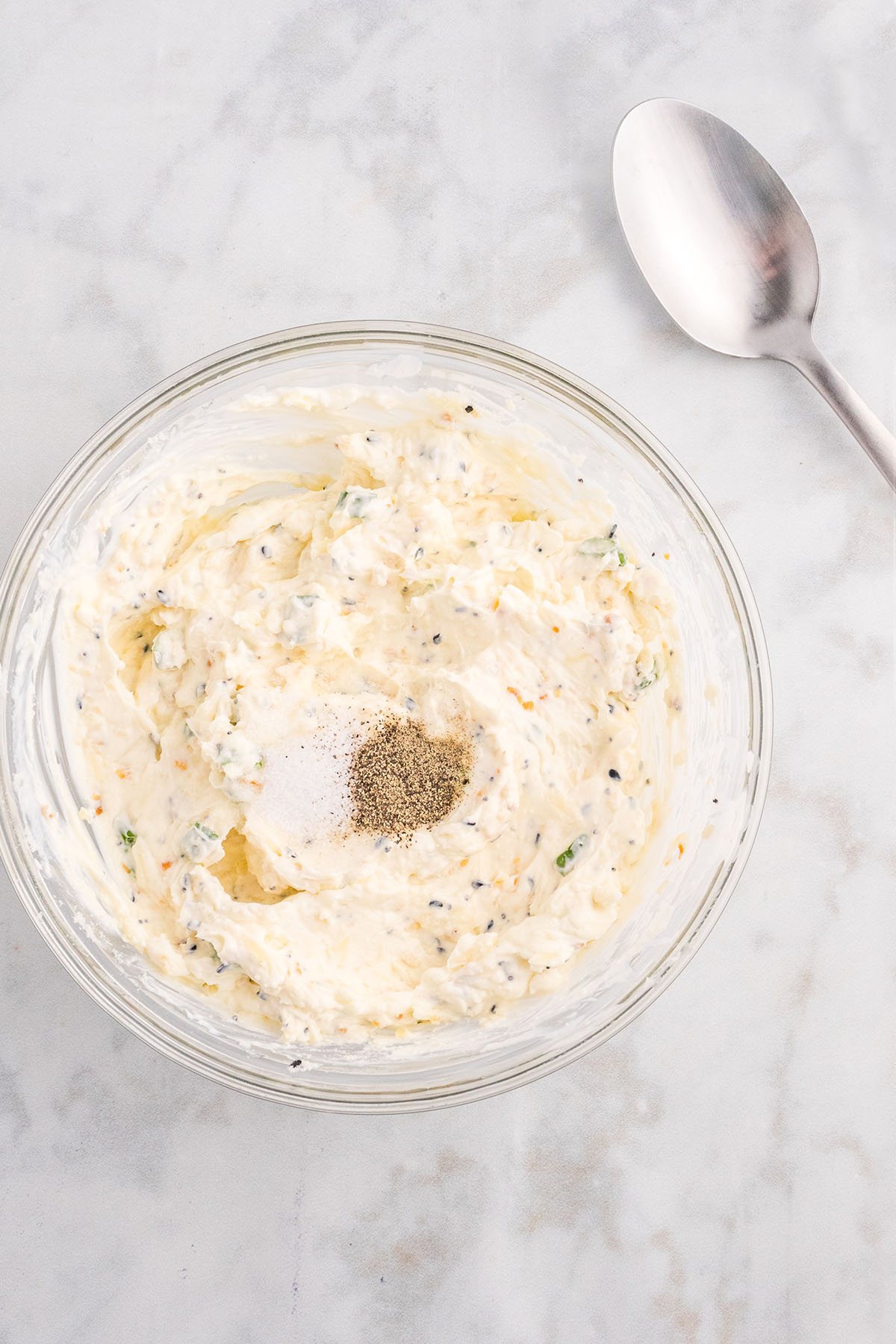 mixing dip in a glass bowl