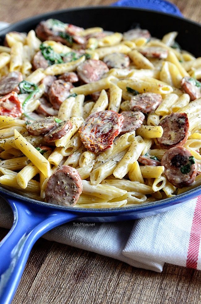 TSavory smoked turkey sausage combined with sun-dried tomatoes, garlic, spinach, and Parmesan cheese make this a sensational 15-minute Smoked Sausage Alfredo recipe the whole family will love. Get the full printable recipe at cetcu.com