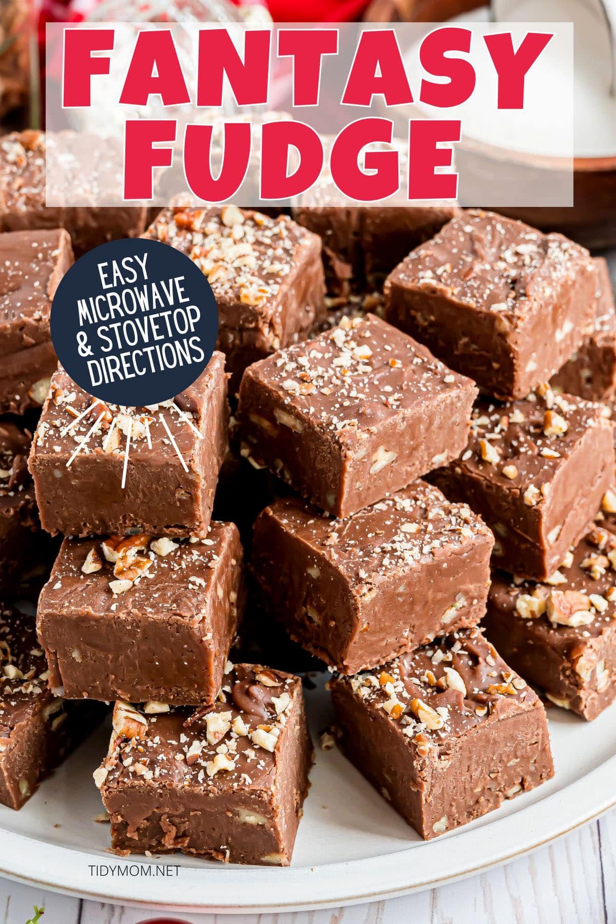 stack of fantasy fudge with nuts on a white plate