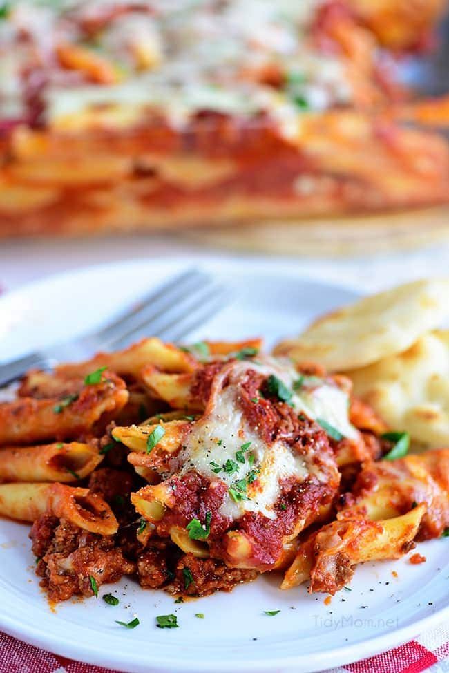 This family recipe for Three Cheese Baked Mostaccioli is a wonderful cheesy pasta dish the whole family will be asking for again and again! Get the full recipe + video at cetcu.com #mostaccioli #pasta #cheese #familyrecipe #homemade