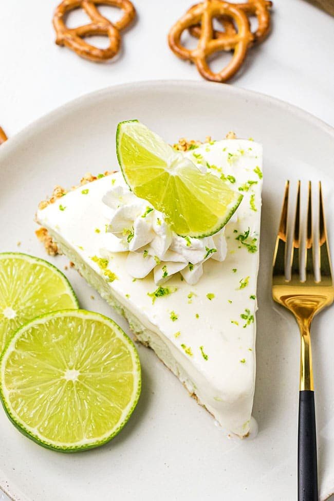 Margarita frozen pie on a white plate with pretzel crust