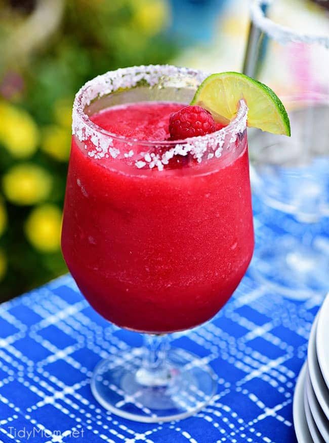 Frozen Rasberry Margarita is the perfect summer cocktail. Raspberry sorbet makes a refreshing twist on the traditional margarita, for a cool party sip! Get the full recipe at cetcu.com