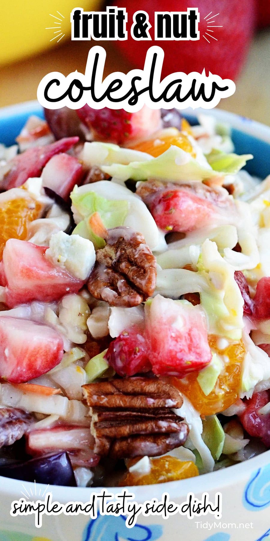 fruit and nuts coleslaw in a blue bowl