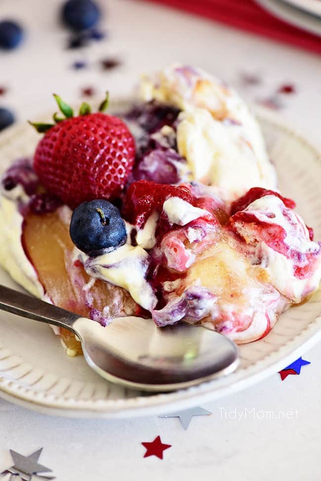 A serving of patriotic fruit trifle on a plate