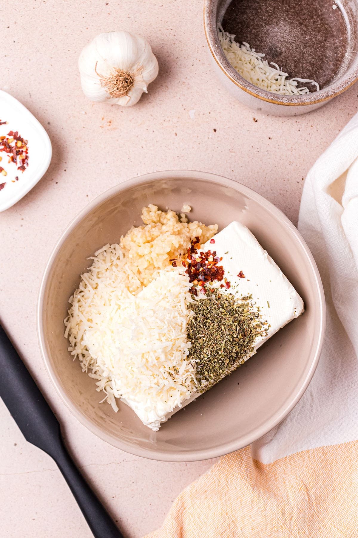 cream cheese and seasonings in a bowl