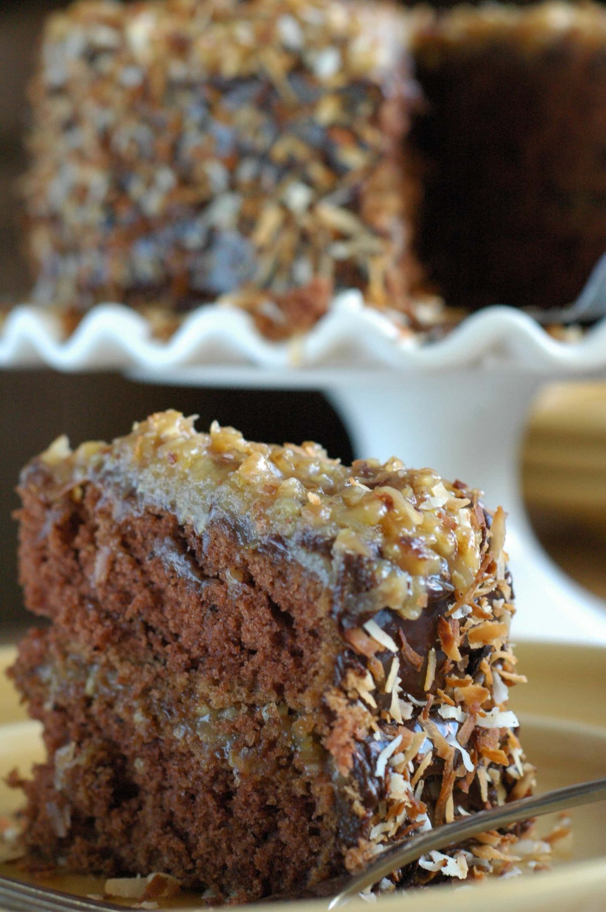 German Chocolate Cake infused with rum and toasted coconut! recipe at cetcu.com