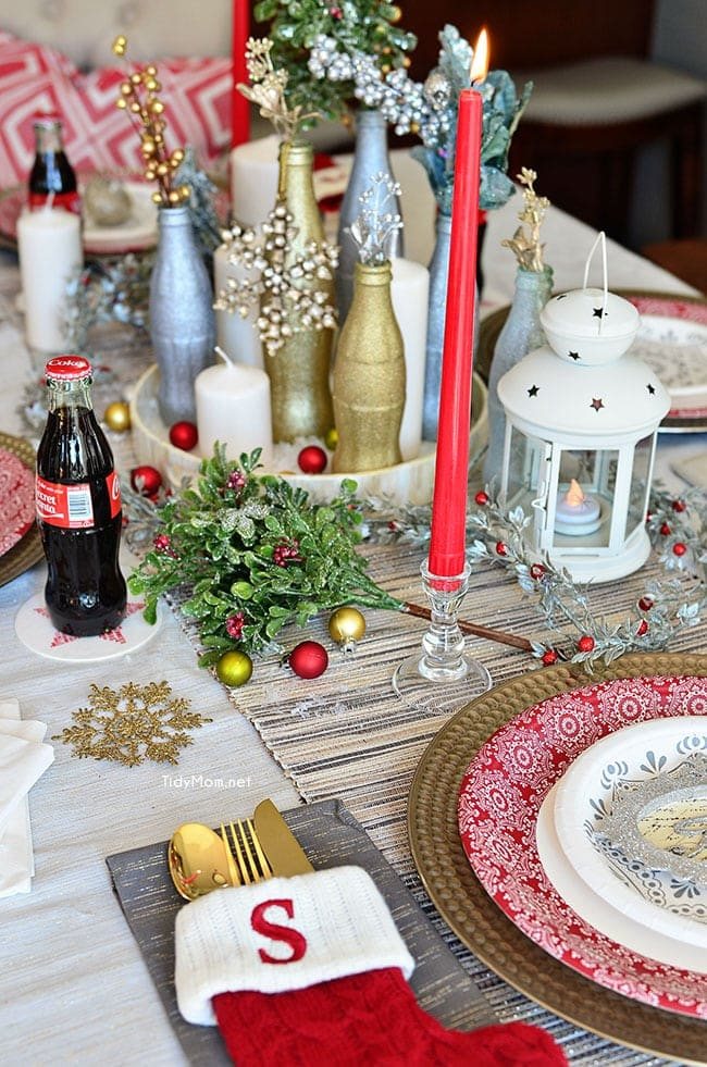 Use empty Cocoa Cola bottles as a pretty holiday table centerpiece. Just paint with glitter spray paint and add some holiday florals, and arrange on a tray. Easy and costs almost nothing! details at cetcu.com