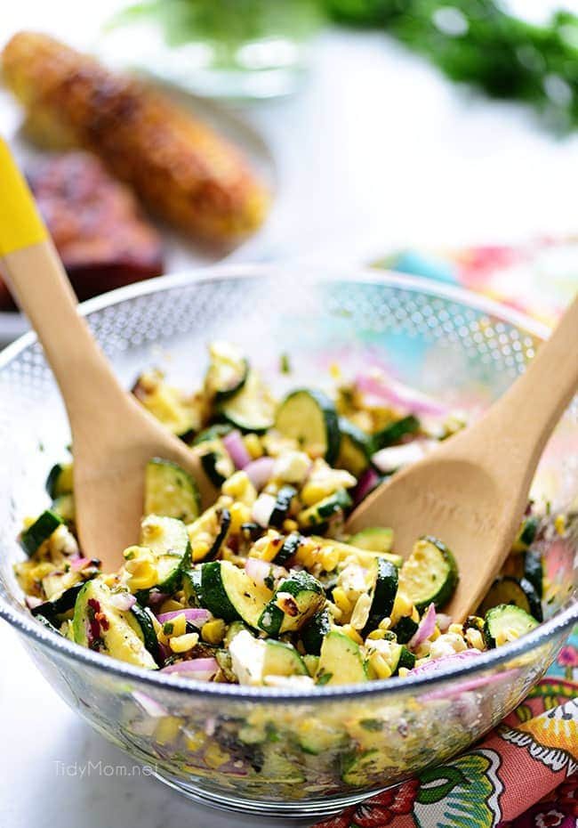 Fresh grilled corn and zucchini salad in a glass bowl