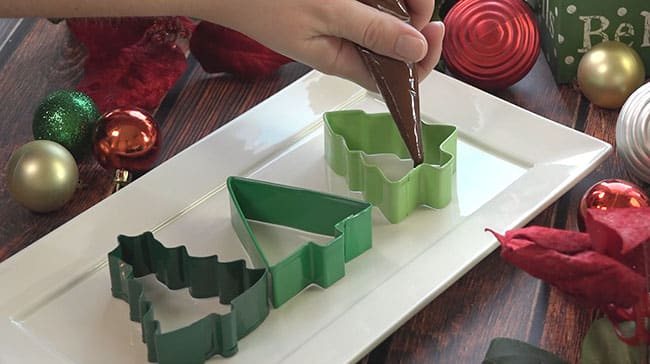 Peppermint bark is ridiculously easy to make. Use cookie cutters for Christmas Tree Peppermint Bark and you have an indulgent luxurious looking treat that’s great for gifting! Get directions and recipe at cetcu.com