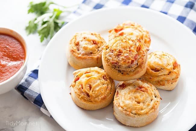 Homemade pizza rolls put a new spin on pizza night! Stuffed with cheese and pepperoni what’s not to love about a pizza pinwheel?