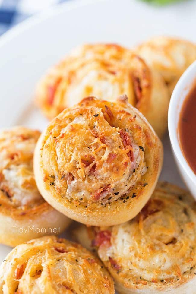 Homemade pizza rolls put a new spin on pizza night! Stuffed with cheese and pepperoni what’s not to love about a pizza pinwheel? Watch the quick recipe video + print the recipe at cetcu.com