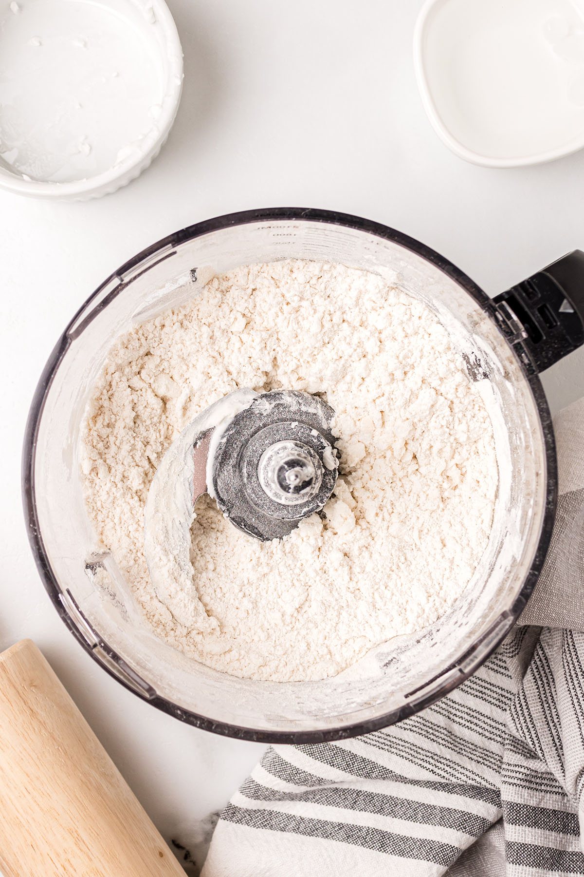 mixing pie crust in a food processor