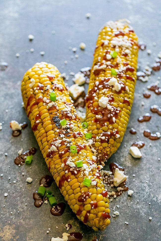 Sriracha Grilled Corn image from Sweet C's Designs: How to Plan a Perfect Picnic. Get recipes, printables and more to plan a perfect picnic at cetcu.com