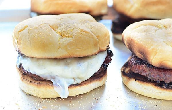 Plank Grilled Peppercorn and Provolone burgers. Recipe and video tutorial at cetcu.com