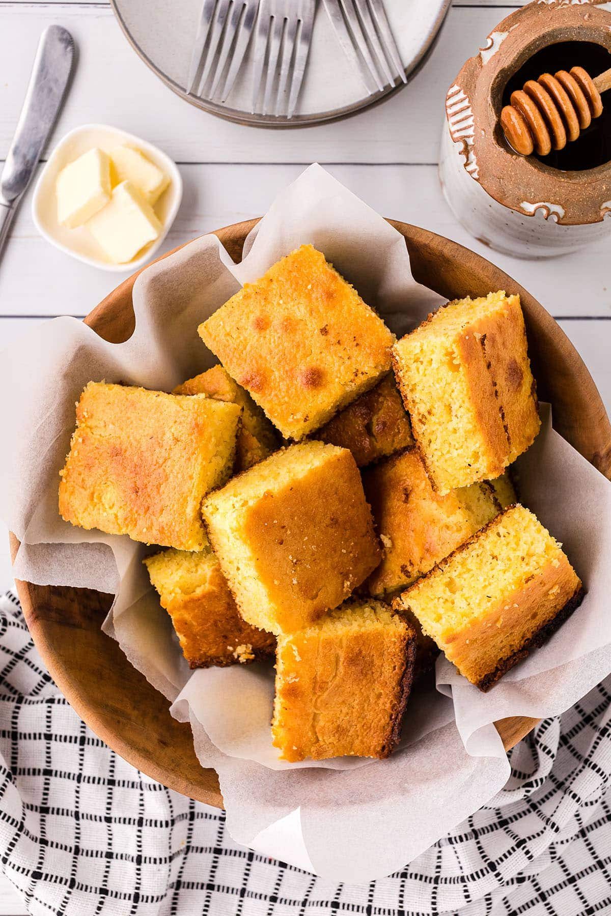 a basket of cut servings of cornbread