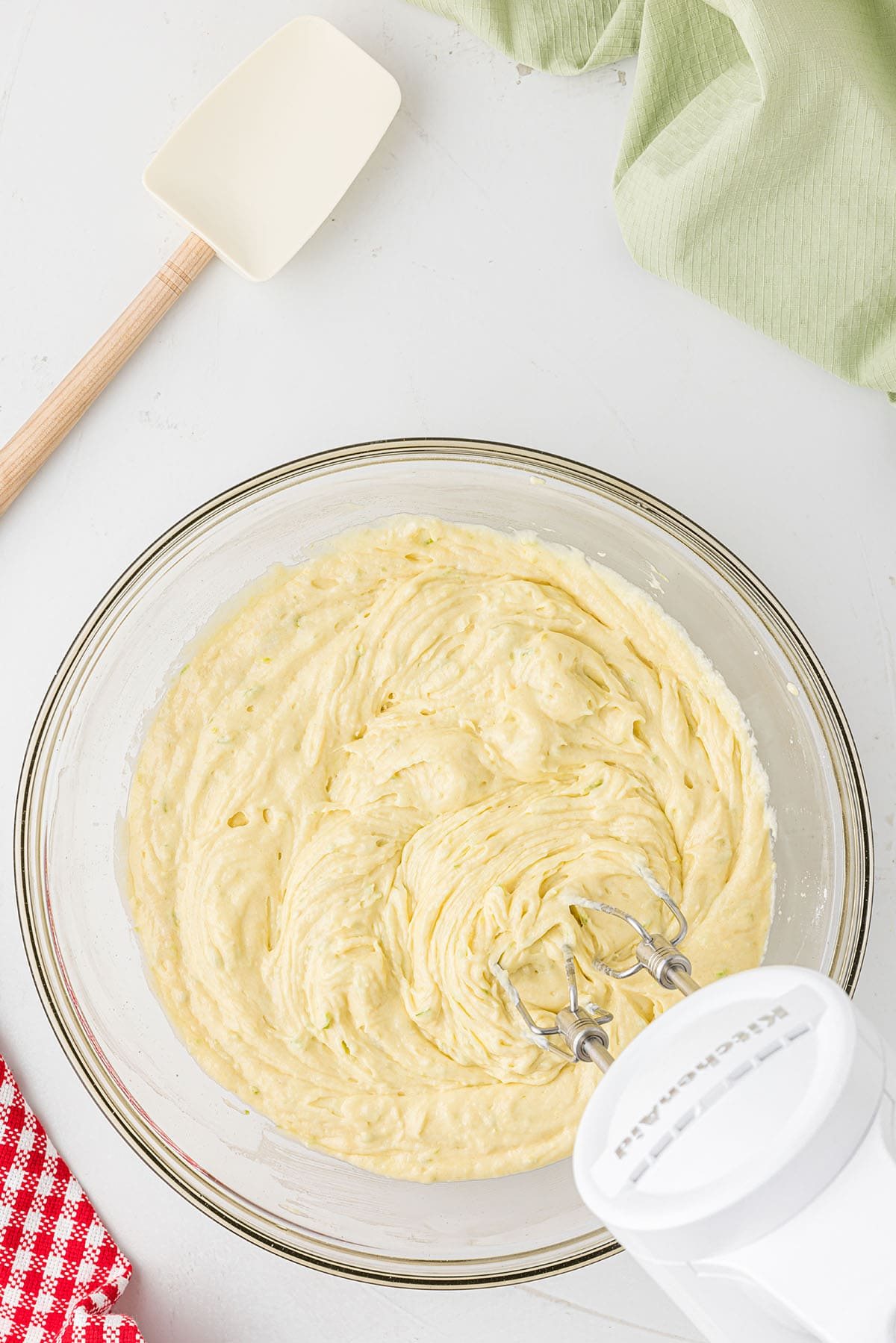 bowl of cake batter and a hand mixer