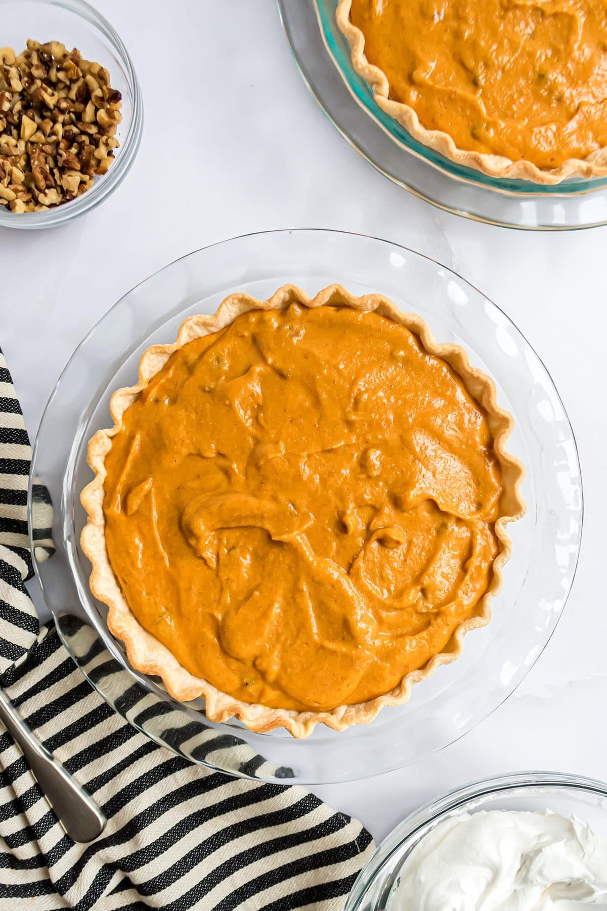 pumpkin pie filling in a baked pie shell