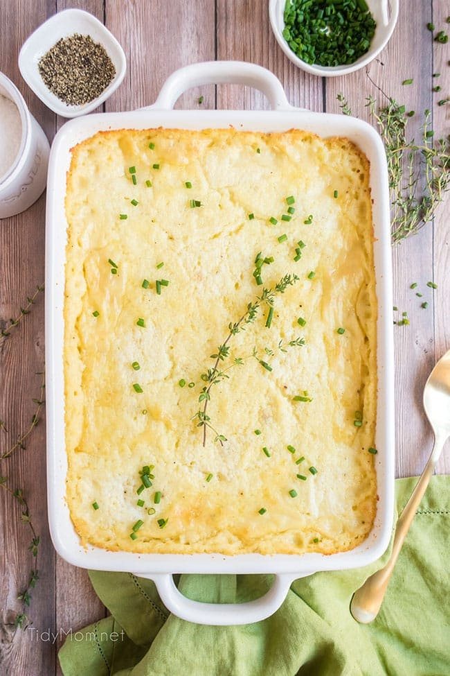 make ahead mashed potatoes in a white serving dish