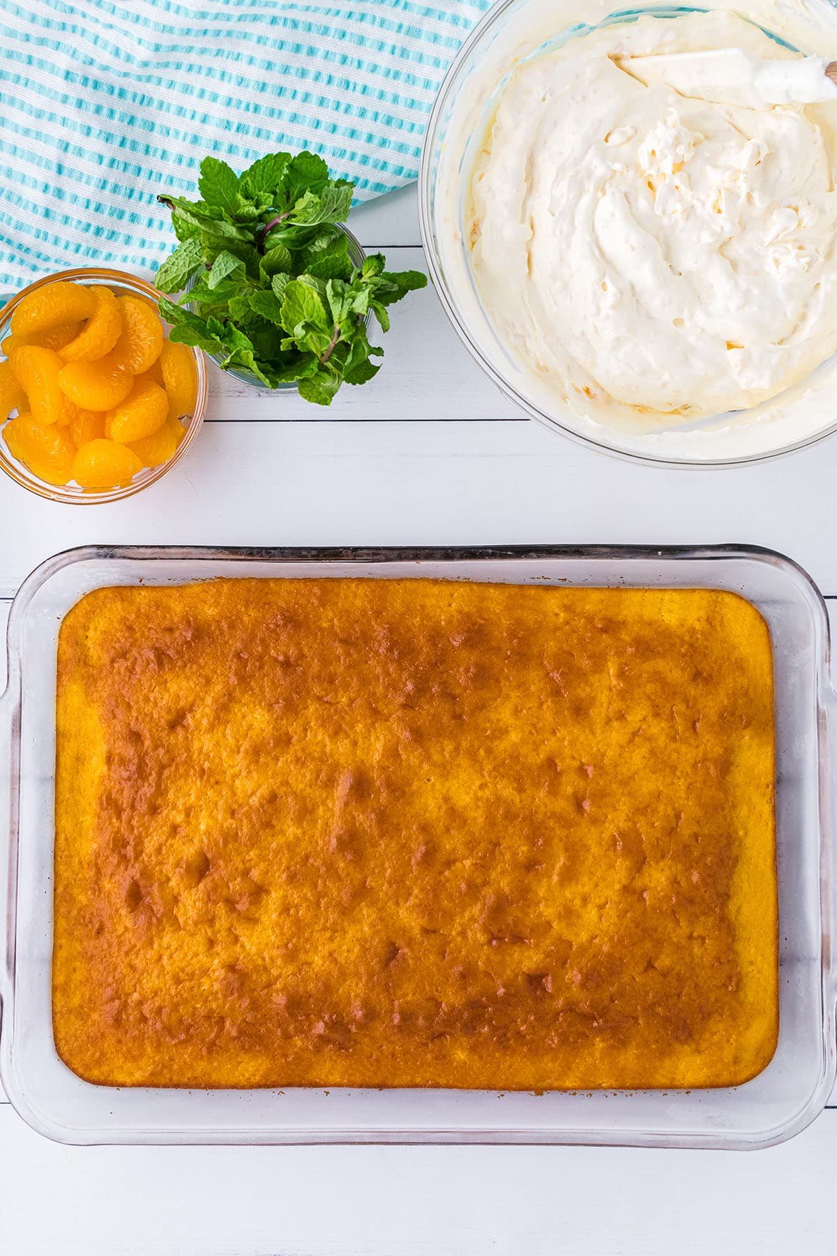 baked orange cake in 9x13 glass dish