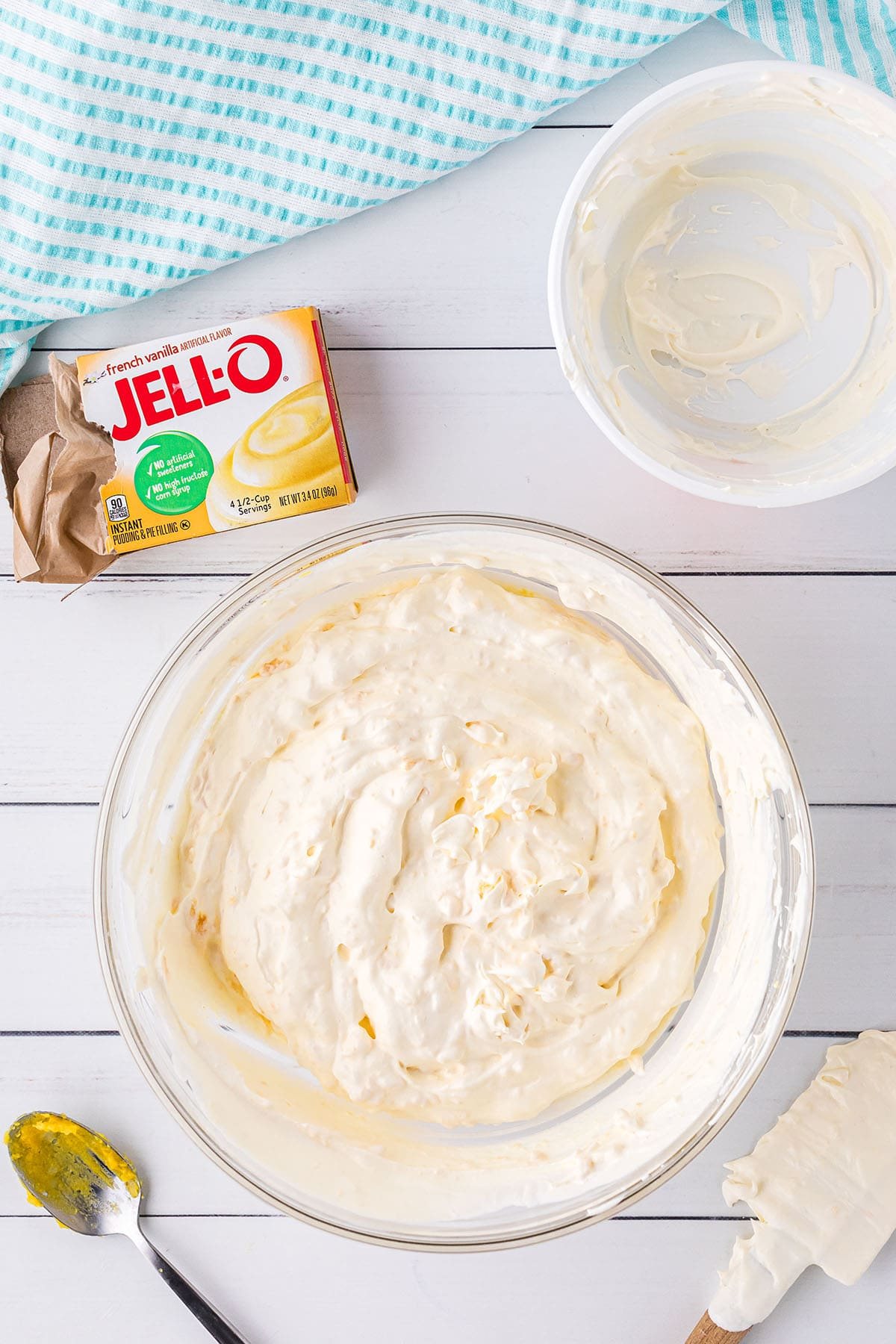 pineapple cool whip frosting in a bowl