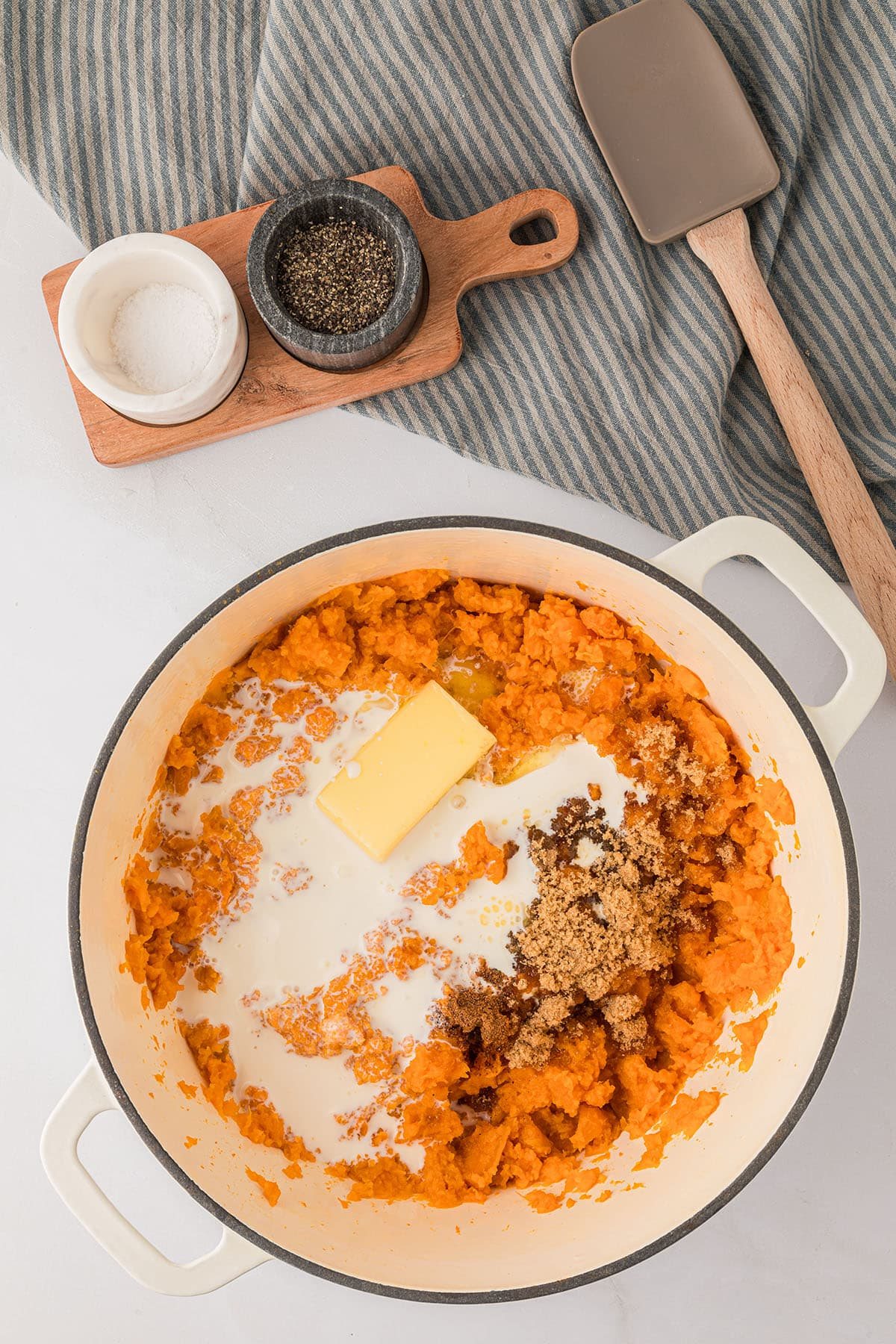 butter, milk and brown sugar added to cooked sweet potatoes