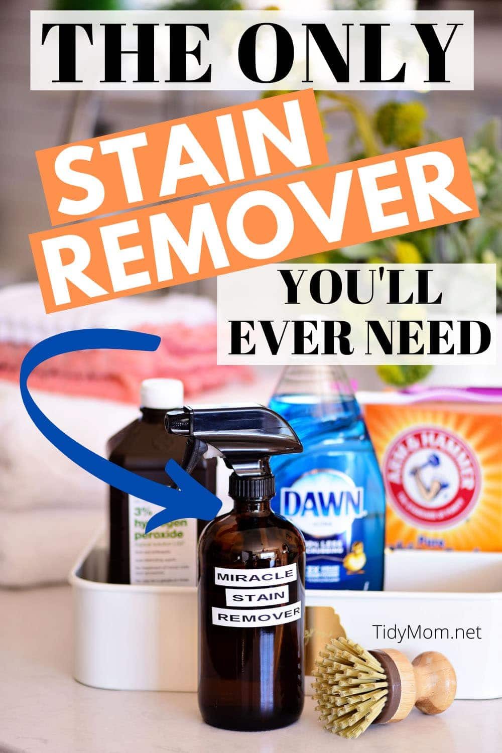 diy stain remover in a brown bottle with ingredients behind it