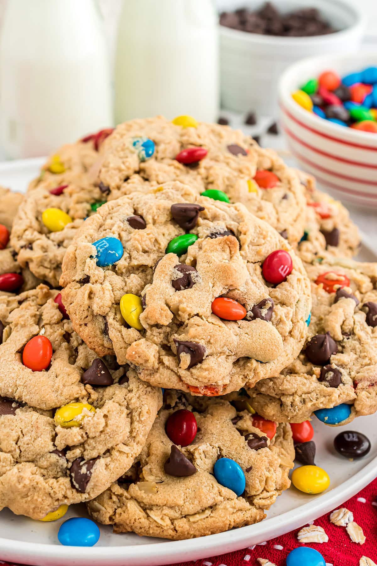 a plate stacked with monster cookies