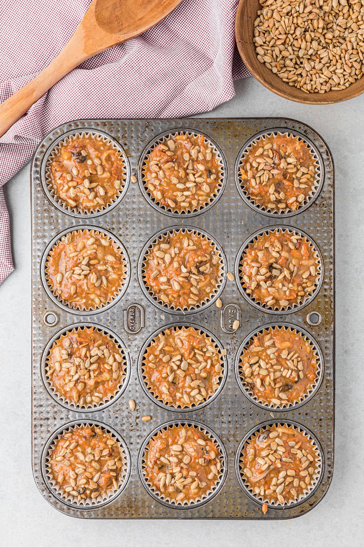 muffin batter in a muffin pan