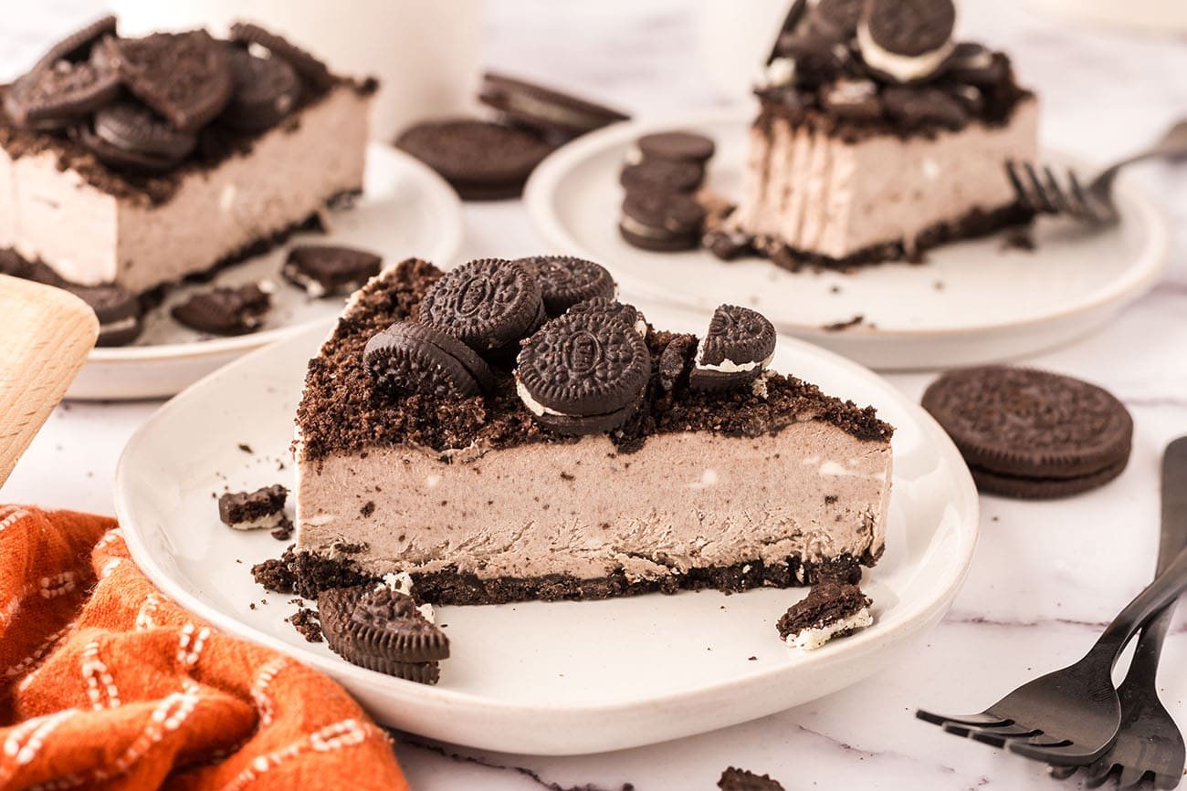 slice of cheese cake with cookies