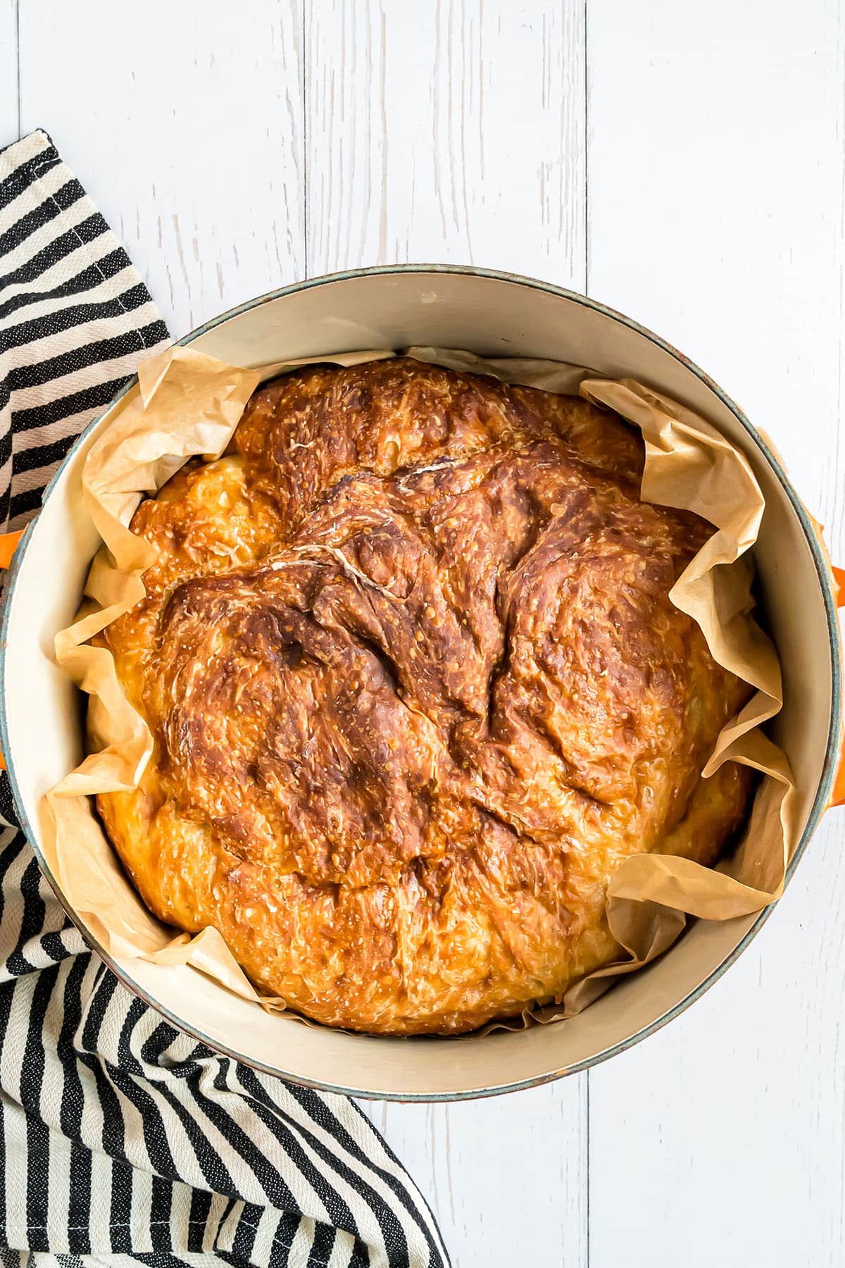 loaf of no-knead bread baked in a dutch oven