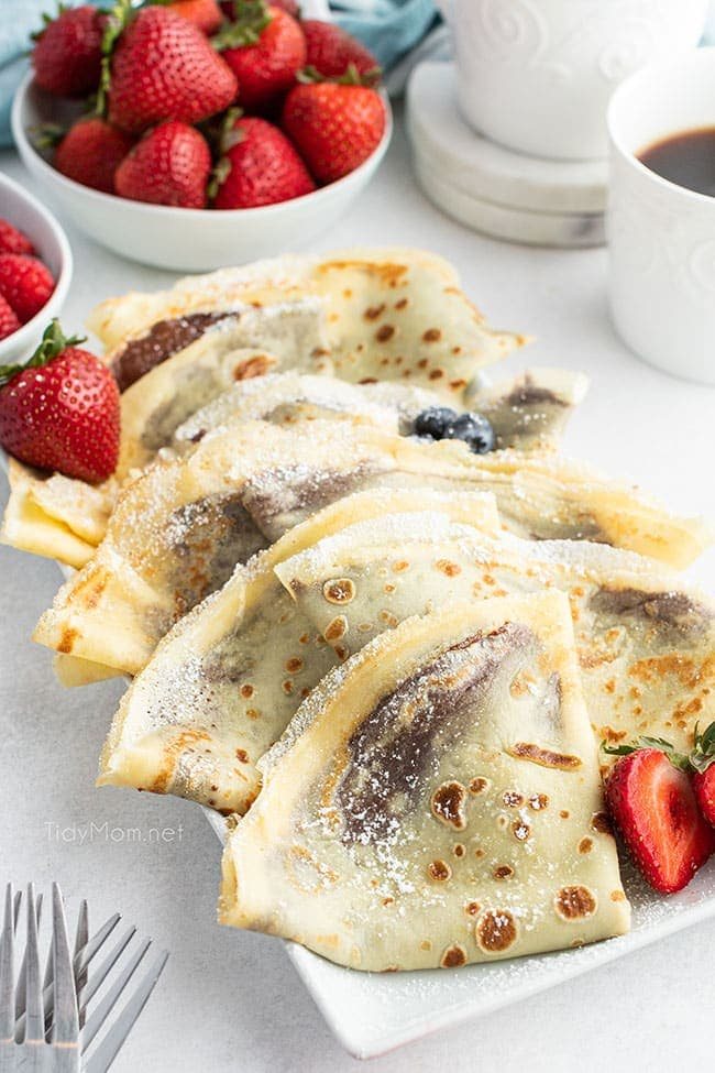 crepes with strawberries on plate