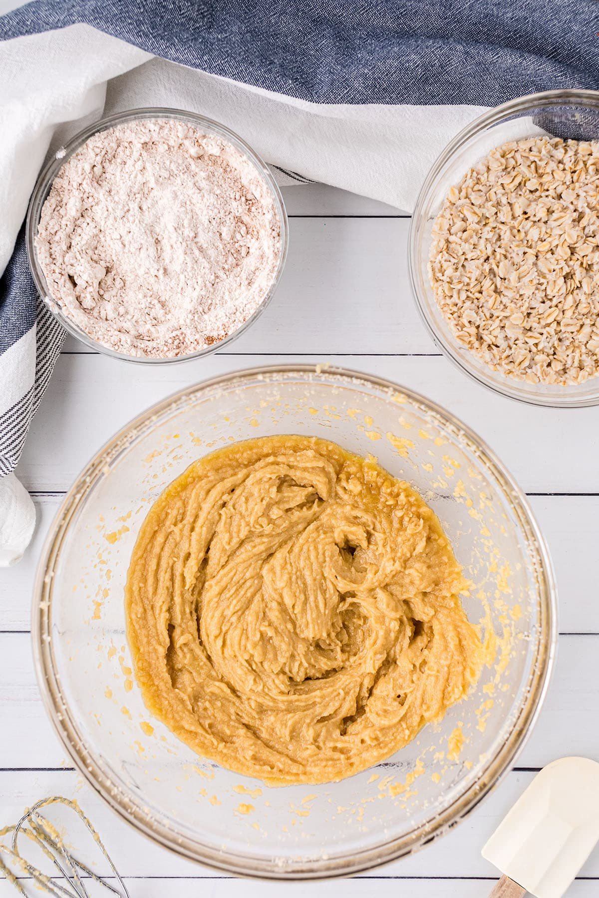 mixing bowls with cake batter and other ingredients