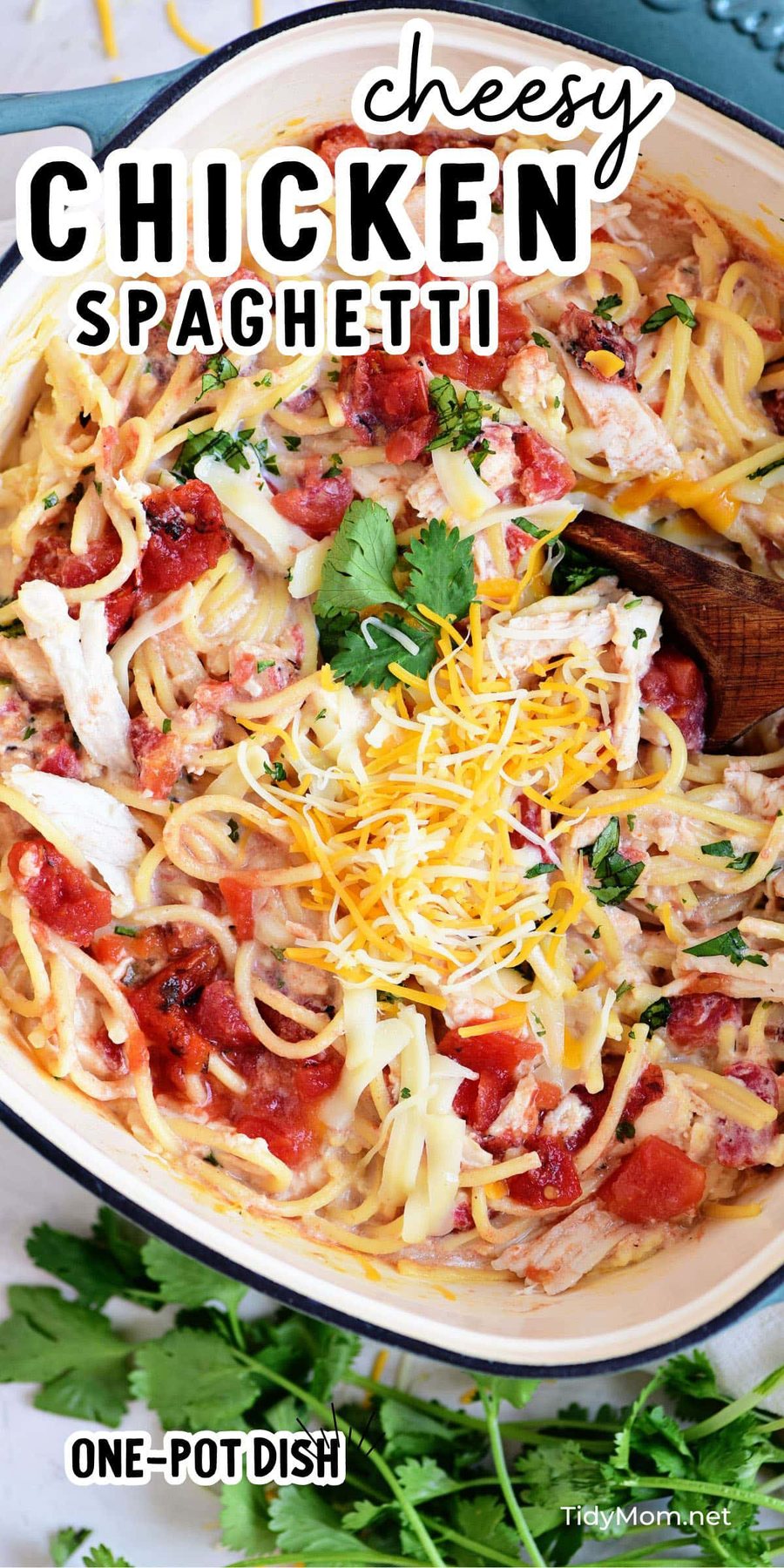 cheesy chicken spaghetti in a cast iron pot