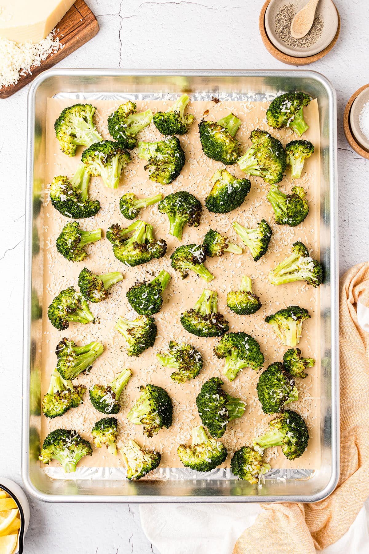 freshly roasted broccoli with parmesan sprinkled on top