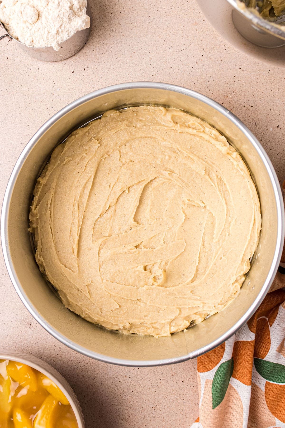 coffee cake batter in a springform pan.