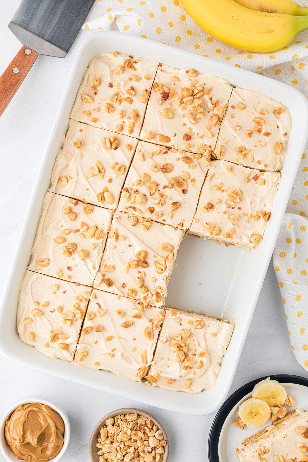 icebox cake in a white dish cut into servings with one serving plated