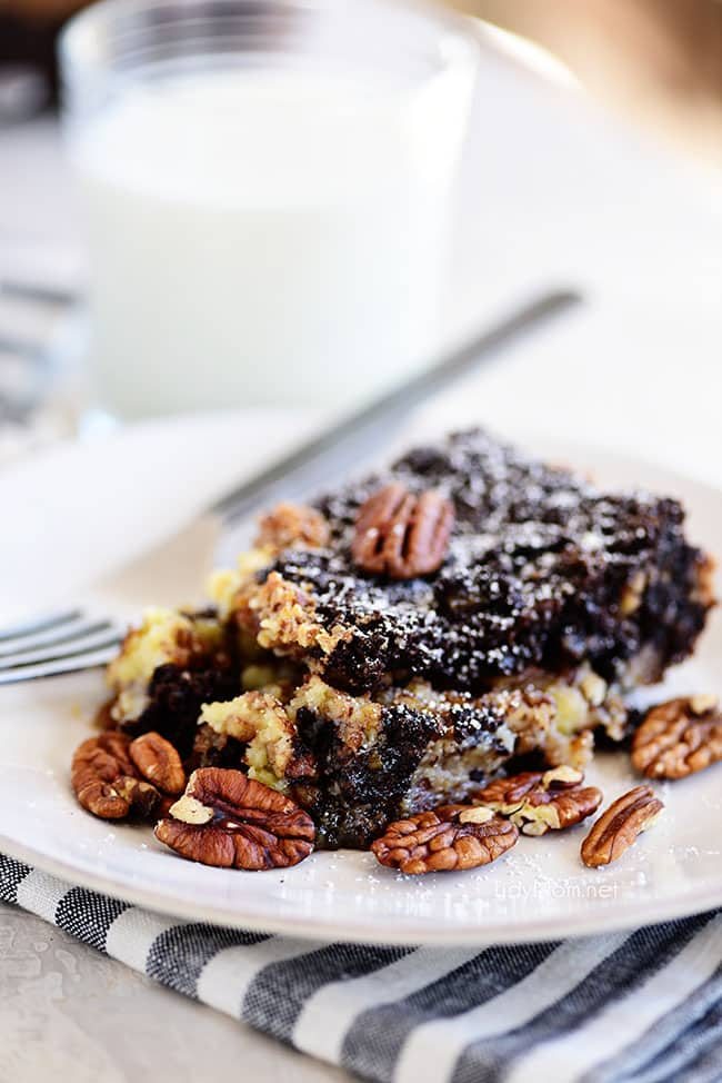 Chocolate Pecan Pie Gooey Butter Cake on a white plate