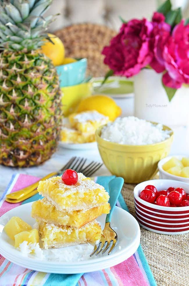 Channel the tropics, lounging on a white sandy beach, with these Pina Colada Bars. Enjoy the flavors of coconut and pinaple and consider it your ticket to a mental tropical paradise. grab the recipe at cetcu.com