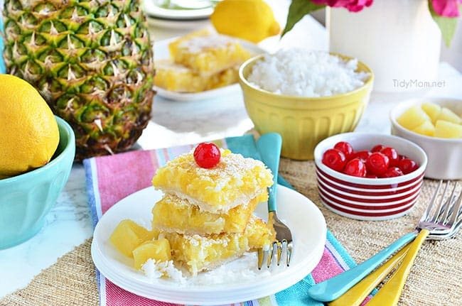 Channel the tropics, lounging on a white sandy beach, with these Pina Colada Bars. Enjoy the flavors of coconut and pinaple and consider it your ticket to a mental tropical paradise. grab the recipe at cetcu.com
